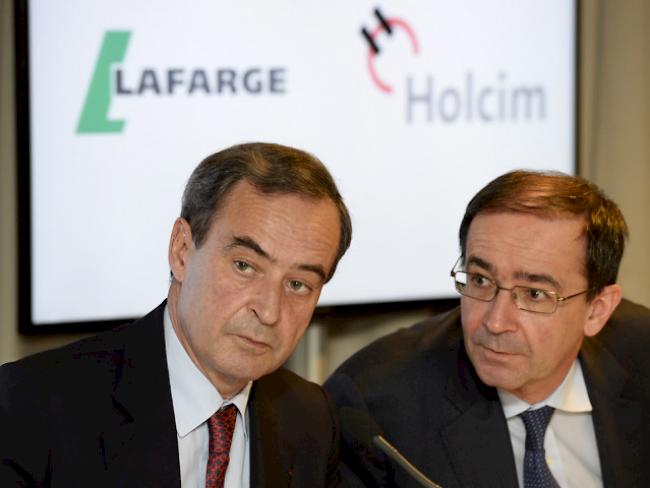 Dürfen Anteile verkaufen: Die CEOs von Lafarge und Holcim (Archiv)