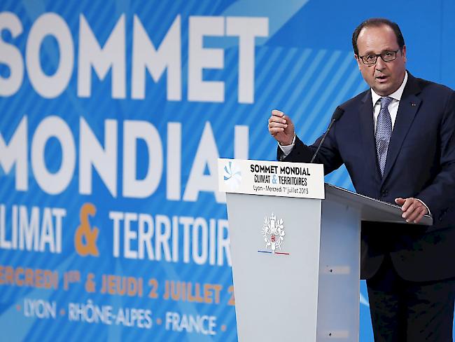 Frankreichs Präsident François Hollande eröffnet in Lyon die regionale Konferenz zum Kampf gegen den Klimawandel.