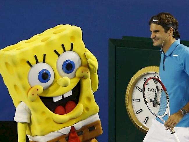 Spongebob - hier mit Roger Federer auf dem Tennis Court - kommt bald singend auf die Bühne. David Bowie, Cindy Lauper und Aerosmith komponieren für ihn (Archiv)