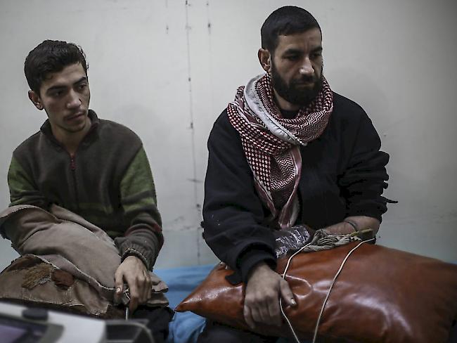 Verletzte Syrer in der Nähe von Damaskus.