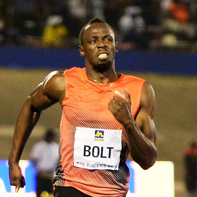 Usain Bolt muss auf die Zähne beissen, setzt sich aber klar durch