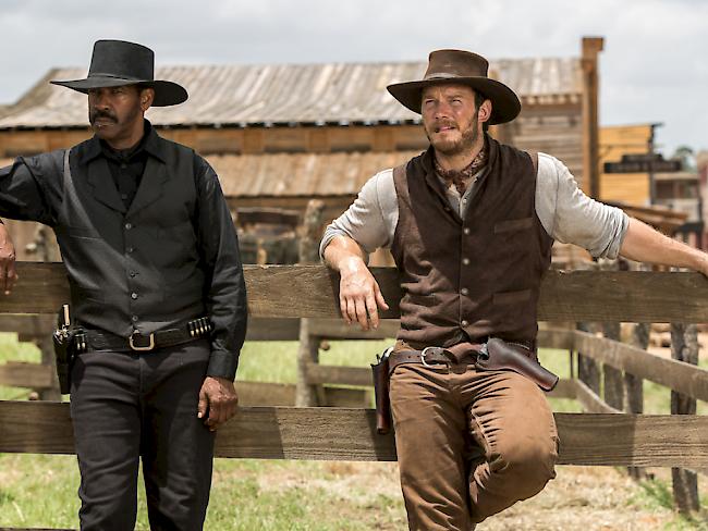 Chris Pratt (r) und Denzel Washington spielen Hauptrollen im Western "The Magnificent Seven" (Archiv)