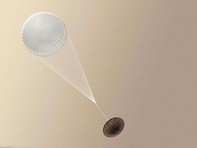 Der Eintritt in die Atmosphäre und das Abbremsen per Fallschirm schien nach Plan zu verlaufen. Danach brachen die Signale vom Mars-Landemodul "Schiaparelli" jedoch ab. (Illustration)