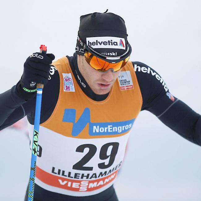 Dario Cologna müht sich in den Loipen von Lillehammer ab
