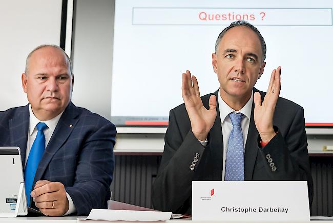 Auf Distanz. Bildungsdirektor Christophe Darbellay und Claude Pottier, Dienstchef für Berufsbildung.