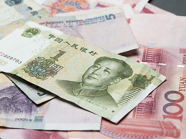 Renminbi-Noten: Der Internationale Währungsfonds IWF prüft, ob die chinesische Währung in den IWF-Währungskorb aufgenommen werden soll. Für China wäre es ein Prestigeerfolg (Symbolbild)