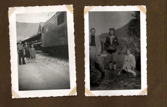 Familie vor dem Bahnhof Brig (links).