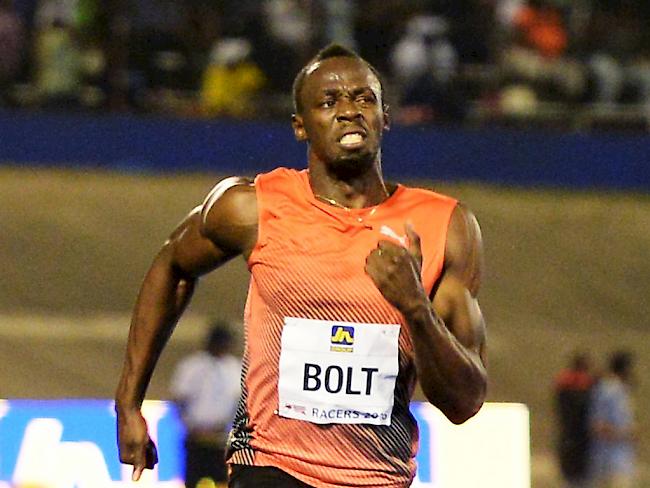 Usain Bolt muss auf die Zähne beissen, setzt sich aber klar durch