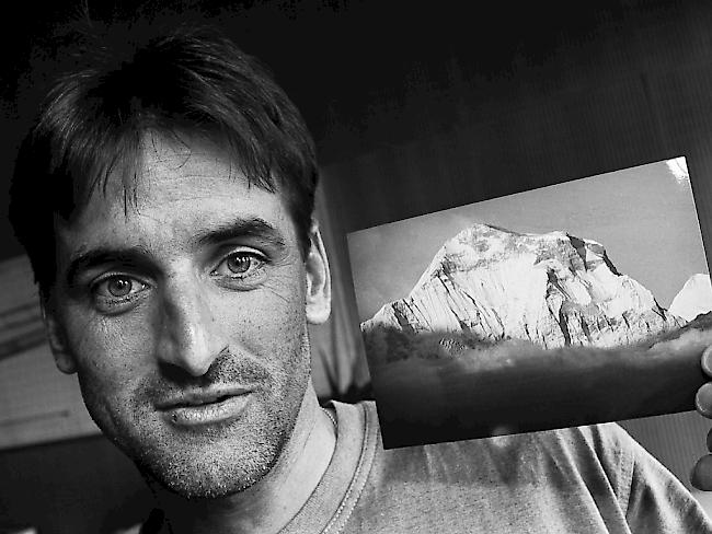 Am Piz Bernina in den Tod gestürzt: Bergsteiger Norbert Joos. Im Bild mit einer Aufnahme des Himalaja, aufgenommen im Jahr 1995.