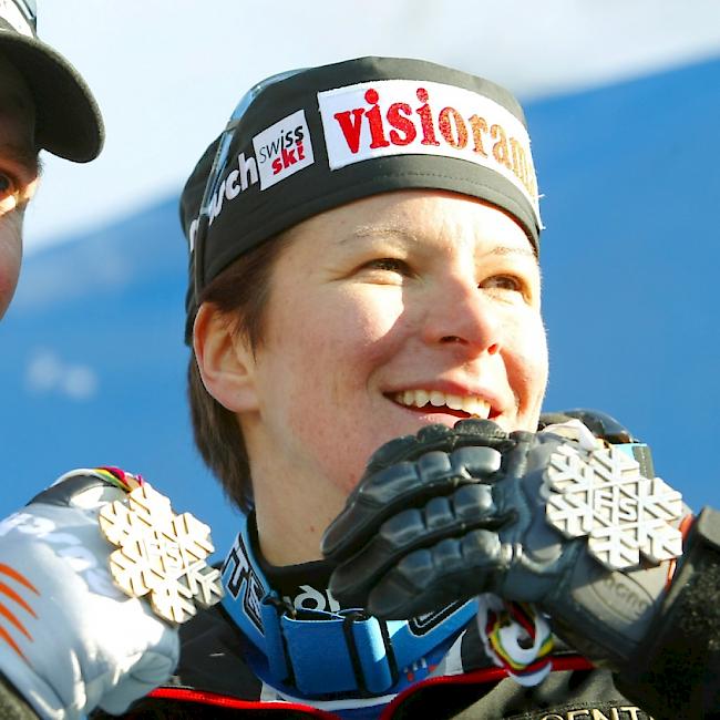 Gewannen 2003 bei den letzten Titelkämpfen in St. Moritz zwei von vier Schweizer Medaillen: Corinne Rey-Bellet und Bruno Kernen
