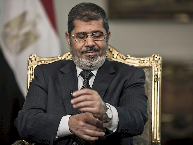 Ägyptens Ex-Staatschef Mohammed Mursi (in einer Aufnahme vom Mai 2013) ist nach Ansicht des türkischen Präsidenten Recep Tayyip Erdogan umgebracht worden..