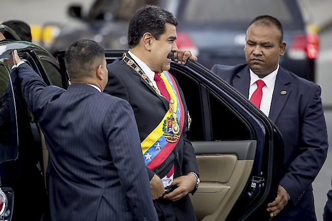 Gezielte Attacke? Venezuelas Präsident Nicolás Maduro blieb beim Zwischenfall unverletzt. Die Drahtzieher des Anschlags sieht Maduro in Kolumbien und den USA.
