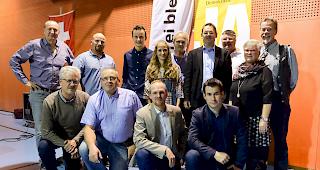 Gr&uuml;ndung der Bezirkspartei SVP Westlich Raron und der Ortspartei SVP Raron &ndash; St. German (hintere Reihe von links): Guido Schmid, Claudio Roth, Romano Amacker, Silja Schmid- Erne, Dieter Frey, Franz Ruppen, Frans Tauber, Prisca Salzmann-Lochmatter und Pius Salzgeber. Vordere Reihe von links: Oskar Henzen, Isidor Burkhardt, Diego Schmid und Martin Julier. 