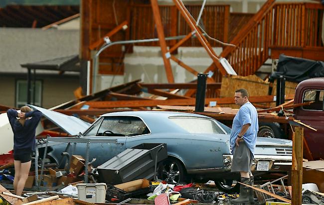 In Teilen der USA haben Tornados eine Spur der Verwüstung hinterlassen.