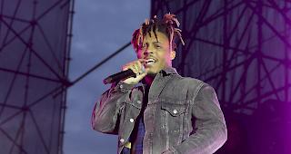 Die Beamten hatten laut "Chicago Tribune" den Rapper am Flughafen erwartet. In seinen Koffern fanden sie demnach Drogen, Waffen und Munition.